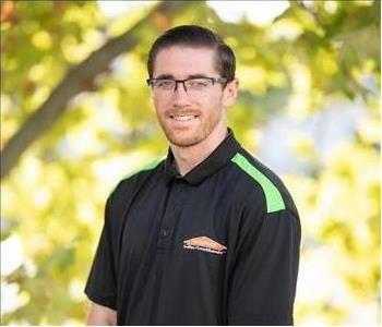 male employee with beard and glasses