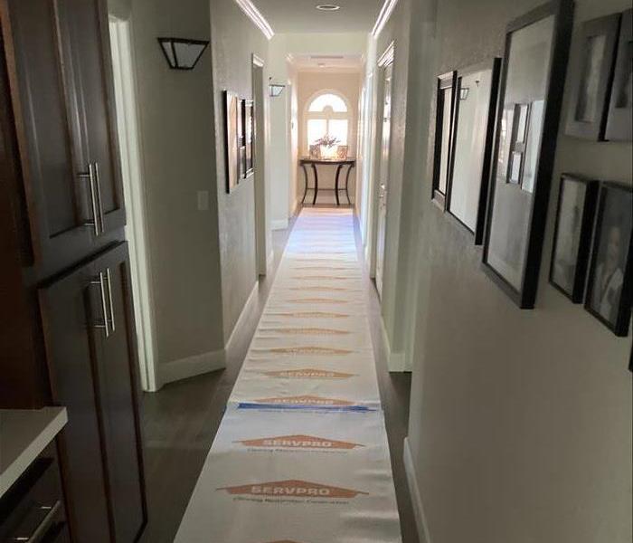 hallway with servpro floor coverings