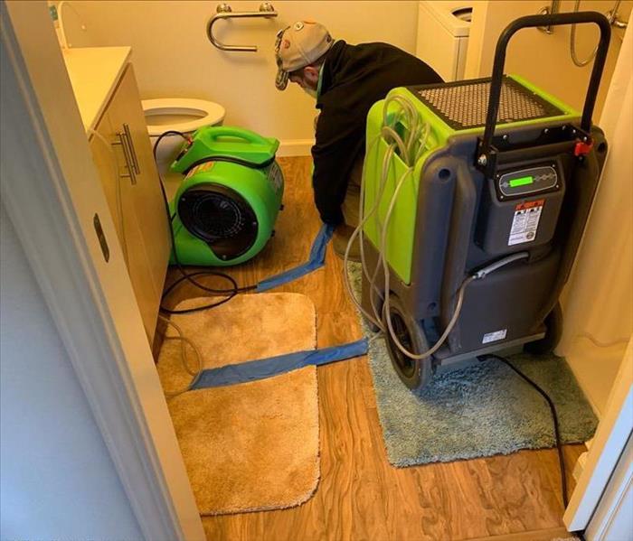 drying process in bathroom with three machines, water damage restoration in rancho cordova, water restoration near me, Sac