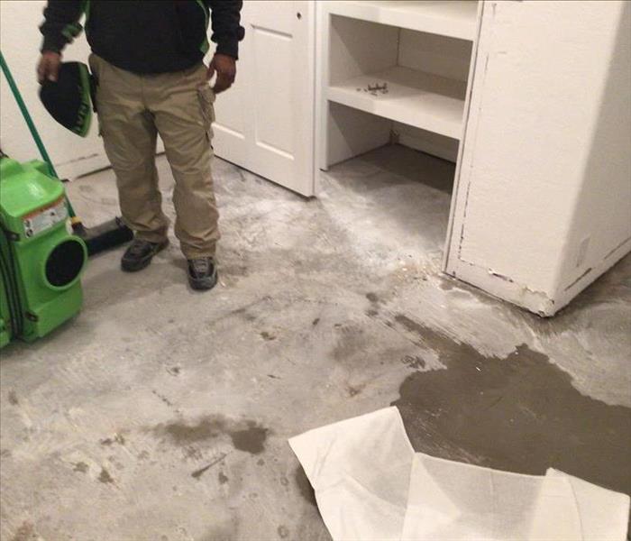 concrete slab wet, water damage in basement in orangevale