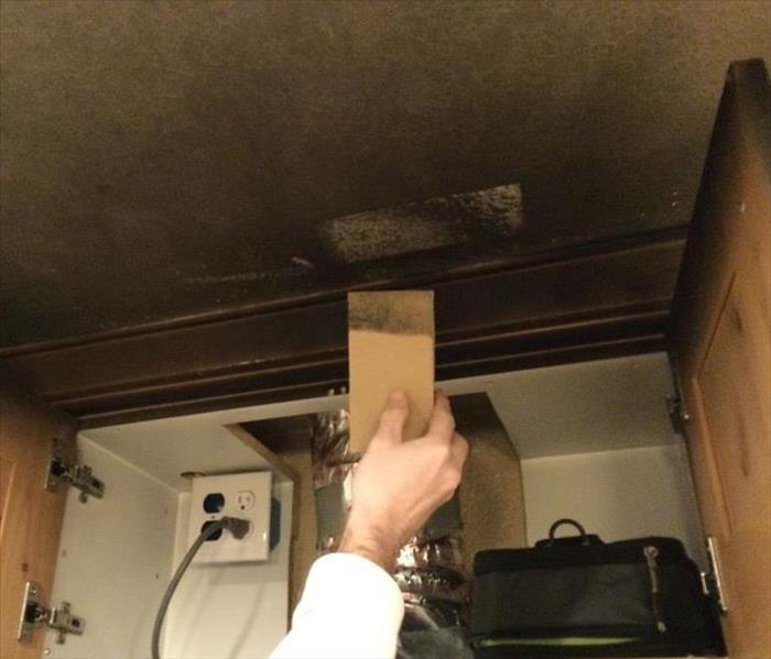 sponge with soot and smoke damage