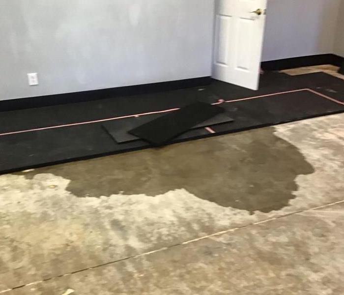 commercial water damage, water in fitness studio, wet concrete, water damage restoration near sac, near by near me carmichael