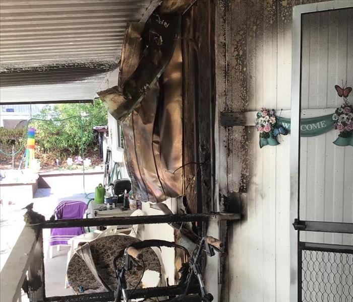 fire damage to exterior siding of Sacramento house