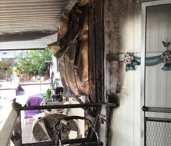 fire damage to exterior siding of Sacramento house