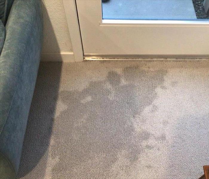 water stain on gray carpet, water damage in la riviera sacramento, water damage in sacramento, water on carpet damage